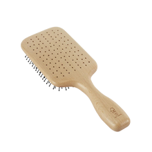 Load image into Gallery viewer, The back side of the Kent Pure Flow large, vented paddle brush.