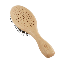 Load image into Gallery viewer, The back side of the Kent Pure Flow Oval Brush.