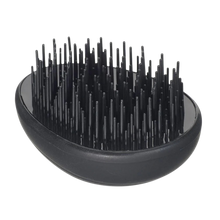 Load image into Gallery viewer, A black oval-shaped hairbrush with dense, flexible bristles.