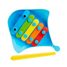 Load image into Gallery viewer, A colourful musical bath toy designed like a stingray with five colorful keys and a yellow mallet.