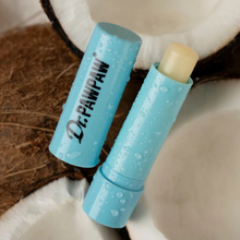Load image into Gallery viewer, Dr.PAWPAW Coconut Lip Balm Stick open with product visible, surrounded by coconut halves