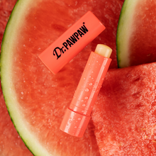 Load image into Gallery viewer, Open Dr. PAWPAW Watermelon Lip Balm Stick in coral packaging displayed on fresh watermelon slices, highlighting its fruity watermelon fragrance.