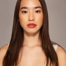 Load image into Gallery viewer, Model wearing Dr.PAWPAW Tinted Ultimate Red Lip Balm – full face view