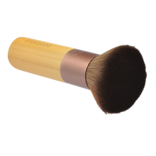 Load image into Gallery viewer, Side angle view of the EcoTools domed bronzer brush showing the thick bamboo handle, metallic ferrule, and plush bristles.