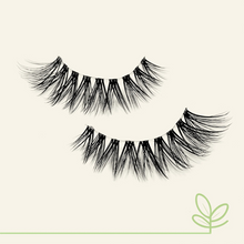 Load image into Gallery viewer, Fluffy and lightweight Eyecha Dusk lashes with bold spacing for a soft, voluminous cat-eye finish