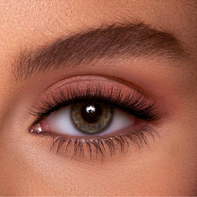 Load image into Gallery viewer, Eyecha Earth false lashes worn on eye showing a short natural wispy finish