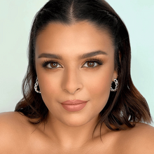 Load image into Gallery viewer, Model wearing Eyecha Sunset lashes with volumising and curled lash look, perfect for evening wear