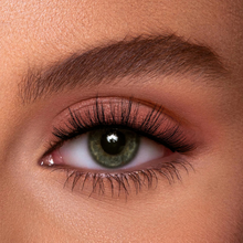 Load image into Gallery viewer, Close-up of model wearing Eyecha Winter Press-On Lashes showing natural volume and definition.