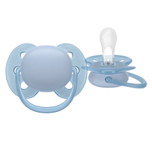 Load image into Gallery viewer, A close-up showing the soft, flexible shield of the Philips Avent pacifier, designed to reduce skin irritation.