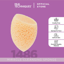 Load image into Gallery viewer, A Real Techniques Miracle Cleansing Sponge on a purple background with a number of benefits listed on the side.