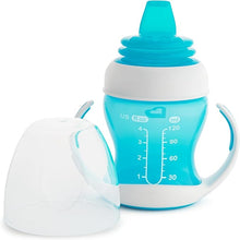 Load image into Gallery viewer, Munchkin Gentle Transition Trainer Cup, 4oz/118ml, Blue, designed for babies 4 months and older. Features a soft silicone spout gentle on gums, removable easy-grip handles, spill-proof design, and a lid for travel. BPA-free, top rack dishwasher safe, suitable for water, milk, or juice.