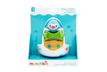 Load image into Gallery viewer, Munchkin Stack n' Match floating bath toy featuring a colourful penguin character that babies can float, stack, and strain water with.
