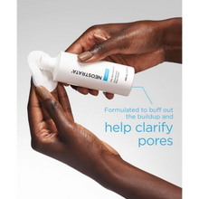 Load image into Gallery viewer, A lifestyle image of a person tilting the NeoStrata Oily Skin Solution bottle to saturate a white cotton pad. Bright blue text explains that the product is "Formulated to buff out the buildup and help clarify pores."