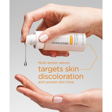 Load image into Gallery viewer, Hands dispensing a drop of NeoStrata Illuminating Serum, with text highlighting its multi-action formula for targeting skin discoloration and uneven tone.