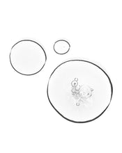 Load image into Gallery viewer, Clear, bubbly texture of a Dual Acid Brightening Peel or serum drop, highlighting the skincare product's liquid consistency.