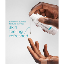 Load image into Gallery viewer, A lifestyle image of a person dispensing a clear drop of NeoStrata Bionic Face Serum from the white bottle onto their fingertips. Teal text highlights that it "Enhances surface texture leaving skin feeling refreshed."