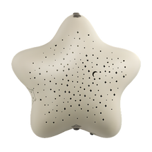 Load image into Gallery viewer, Pabobo Musical Star Projector night light, star-shaped design with perforated dots for projecting stars, moons, and constellations onto the nursery ceiling or walls.