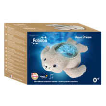 Load image into Gallery viewer, Pabobo Seal Aqua Dream in its packaging, highlighting its animated aquatic projections, lullabies, and automatic shutoff for newborns.