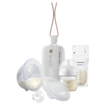 Load image into Gallery viewer, Close-up of Philips Avent hands-free electric breast pump with control unit and silicone breast shield.