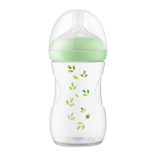 Load image into Gallery viewer, A Philips Avent Natural baby bottle featuring a green screw ring and a decorative green leaf pattern on the clear bottle body, set against a black background.