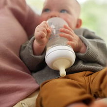 Load image into Gallery viewer, Baby drinking from a Philips Avent Natural Response Baby Bottle 260ml