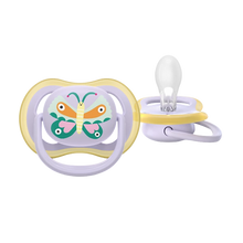 Load image into Gallery viewer, A close-up of a Philips Avent Ultra Air soother for 0–6m featuring a colorful butterfly design and a breathable shield with extra-large airholes.