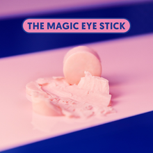 Load image into Gallery viewer, A close-up view of the pink, creamy texture of the Magic Eye Stick balm on a pink and blue background.