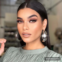 Load image into Gallery viewer, Pinky Goat ARWA lashes styled on model for a dramatic, sleek glam look with long lashes.