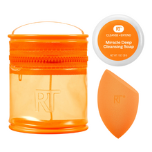 Load image into Gallery viewer, Flatlay of Real Techniques sponge, cleansing soap, and travel tote from the Miracle Blend + Cleanse Set.