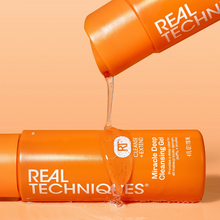 Load image into Gallery viewer, Real Techniques Miracle Deep Cleansing Gel being poured out to show texture.