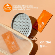 Load image into Gallery viewer, Travel-friendly Real Techniques brush cleansing palette with 2 sample-size gel packets and pouch.