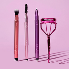 Load image into Gallery viewer, Real Techniques Double Time Brush + Lash Set with brushes and eyelash curler on pink background.