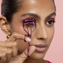 Load image into Gallery viewer, Real Techniques eyelash curler lifting lashes for a fuller, eye-opening effect.