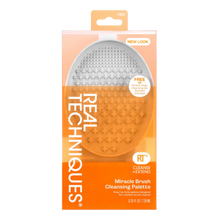 Load image into Gallery viewer, Real Techniques Miracle Brush Cleansing Palette in retail packaging with sample gel included.