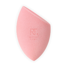 Load image into Gallery viewer, Real Techniques Miracle Powder Sponge showing slanted edge and rounded base