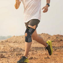 Load image into Gallery viewer, Runner wearing the Uriel Knee Support during outdoor exercise, showing the breathable knee brace with adjustable straps and an open patella design.