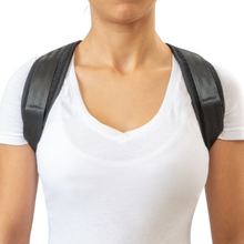 Load image into Gallery viewer, Front view of a woman wearing the Uriel Posture Corrector with comfortable padded shoulder straps for posture support.