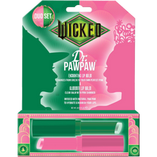 Load image into Gallery viewer, WICKED x Dr. PAWPAW Enchanting & Glimmer Lip Balm Duo in green and pink packaging, featuring two lip balms inspired by Elphaba and Glinda.