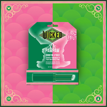 Load image into Gallery viewer, WICKED x Dr. PAWPAW Enchanting Lip Balm in limited-edition green and pink packaging, displayed against a decorative WICKED-inspired background.