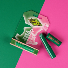Load image into Gallery viewer, Green lip balm and packaging on a pink and green background