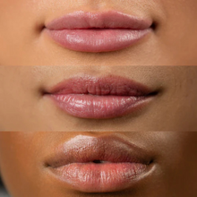 Load image into Gallery viewer,  Close-up of lips wearing WICKED x Dr.PAWPAW Glimmer Balm with pink shimmer finish.