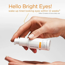 Load image into Gallery viewer, Hand holding Neostrata Brightening Eye Cream bottle with &#39;Hello Bright Eyes!&#39; text on a light gray background
