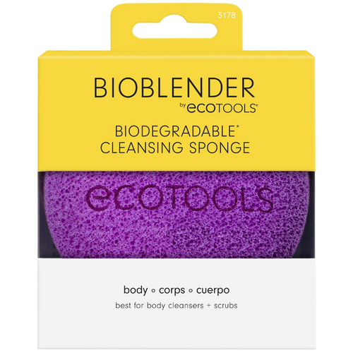 A purple Eco Tools body cleansing sponge with a loop for hanging.