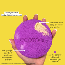 Load image into Gallery viewer, A purple Eco Tools body cleansing sponge with a loop for hanging.
