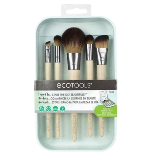 A set of Eco Tools makeup brushes with synthetic bristles, displayed in a clear plastic case with a label.