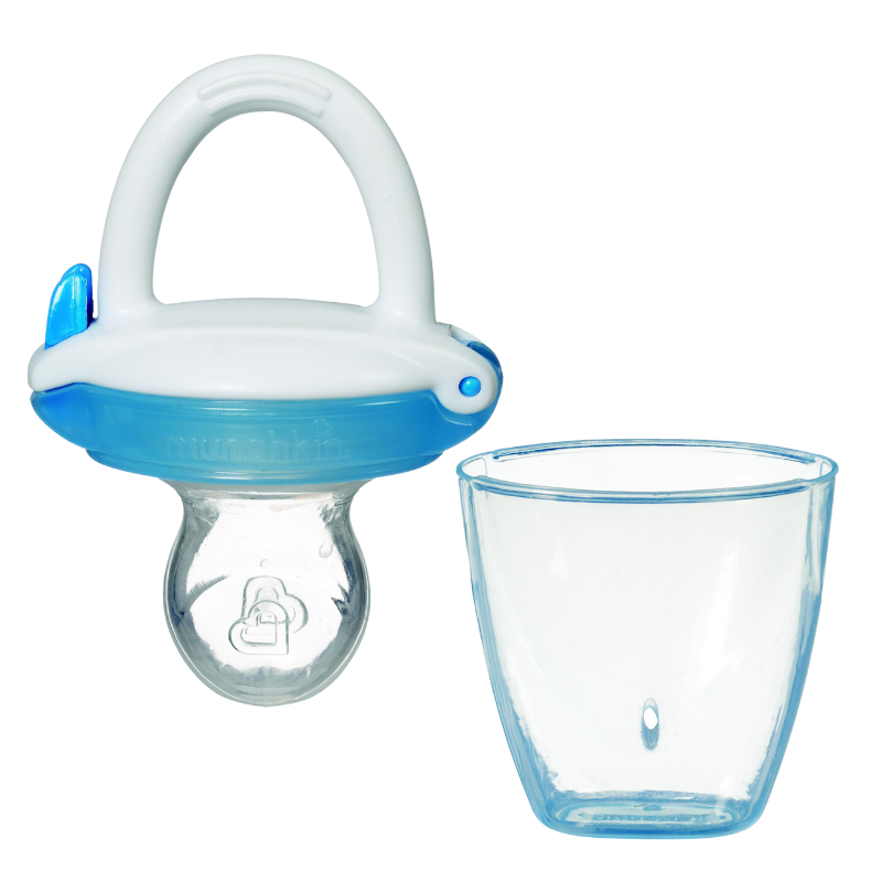 A Munchkin baby food feeder in blue colour with a small hole at the bottom and an attached pouch, alongside an empty clear container.