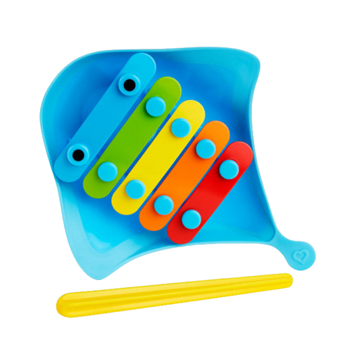 A colourful musical bath toy designed like a stingray with five colorful keys and a yellow mallet.