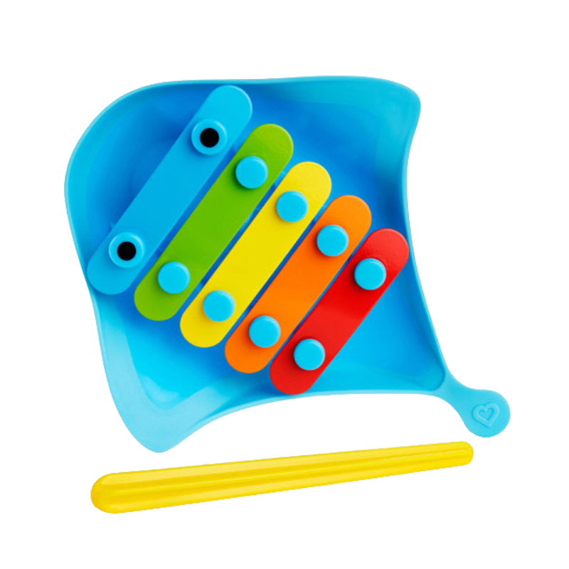 A colourful musical bath toy designed like a stingray with five colorful keys and a yellow mallet.