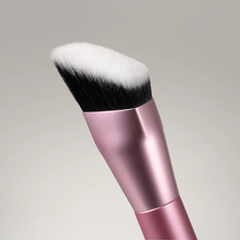Load image into Gallery viewer, Makeup brush with pink handle and white bristles on a gray background
