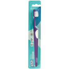 Load image into Gallery viewer, TePe Nova toothbrush with purple handle and blue packaging on a white background
